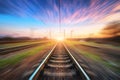 Railway station with motion blur effect. Blurred railroad Royalty Free Stock Photo