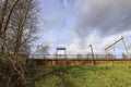 Railway station Nieuwerkerk aan den IJssel with concrete viaduct over ring canal Zuidplaspolder