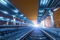 Railway station at night. Train platform in fog. Railroad Royalty Free Stock Photo