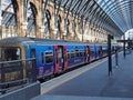 Railway station platform with glass roof