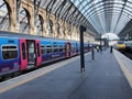 Railway station platform with glass roof Royalty Free Stock Photo