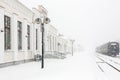 Railway station platform during heavy snowfall. Railway station, city of Romny, Sumy region, Ukraine