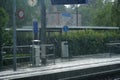 Railway station platform in the rain in Kreuzlingen, Switzerland.