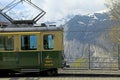 Railway station with swiss train and mountains in Jungfrau, Switzerland.