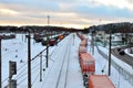 Railway station view of railway wagons, container, cistern and train. Logistics freight transportation by rail. Royalty Free Stock Photo