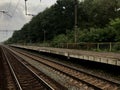 Railway suburban empty platform for commuter trains. Train quarantine and closure concept.