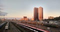 Railway in the suburbs of Moscow. Various types of railway communication. Urban landscape with high-rise buildings.