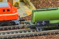 Railway tanker truck. Train hobby model on the model railway. Railroad platforms for transporting of liquid goods and