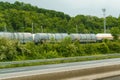 Railway tanks for transporting liquefied gas, fuel and liquid chemicals by rail Royalty Free Stock Photo