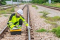 Railway Technician, Rail track Engineer working service maintenance checking train track condition for safety Royalty Free Stock Photo