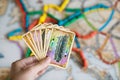 Hand hold cards of Ticket to ride game. Royalty Free Stock Photo