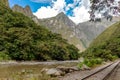 Railway to Machu Pichhu inca citadel and peruvian mountains at sunny day Royalty Free Stock Photo