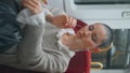 Railway tourist sitting wagon at vacation close up. Short hair woman vertically