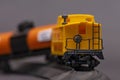 Railway toy train with cars derailed, close-up. Concept: train wreck, train crash and accident Royalty Free Stock Photo