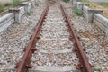 Railway track on gravel with concrete rail ties Royalty Free Stock Photo