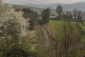 Railway track near Brumov town in spring cloudy day