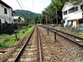 Railway track of Sagano Torokko romantic train visit Arashiyama scenic beauty mountain hill forest and oi river at Kyoto city in Royalty Free Stock Photo