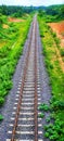 Railway track between two forest in tripura state, India country Royalty Free Stock Photo