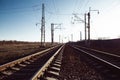 Railway tracks and electric lines in the industrial zone. Travel. Royalty Free Stock Photo
