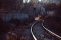 Railway tracks and electric lines in the industrial zone. Royalty Free Stock Photo