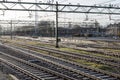 Railway tracks in morning sun at the Dutch station of The Hague Royalty Free Stock Photo