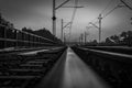 railway tracks on the railway bridge over the river in black and white version Royalty Free Stock Photo