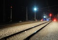 Railway and train signal at night