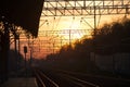 Railway and train station on the sunset Royalty Free Stock Photo