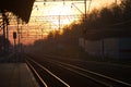 Railway and train station on the sunset Royalty Free Stock Photo