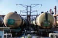 Railway trains with tanks for the transport of petroleum products are on the siding