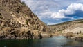 Railway and the Trans Canada Highway follow the Thompson River with its many rapids flowing through the Coastal Mountains Royalty Free Stock Photo