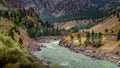 Railway and the Trans Canada Highway follow the Thompson River with its many rapids flowing through the Coastal Mountains Royalty Free Stock Photo