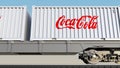 Railway transportation of containers with Coca-Cola logo. Editorial 3D rendering