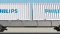 Railway transportation of containers with Philips logo. Editorial 3D rendering 4K clip