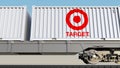 Railway transportation of containers with Target Corporation logo. Editorial 3D rendering