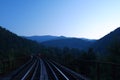 Railway among the Ukrainian mountains at sunset