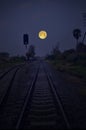 Railway under full moon sky in the evening