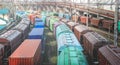 Railway wagons with cargo of metal and grain in port of Odessa. trains are waiting in line for loading at cargo terminal.