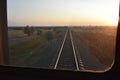 Railway from the window of the train while Royalty Free Stock Photo