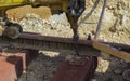 Railway workers bolting track rail. Royalty Free Stock Photo