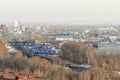 Railways in industrial zone near residental flats. Containers with goods at the freight depot Royalty Free Stock Photo