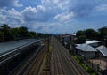 Railways and platform of train station viewed from high angle in Jakarta Indonesia