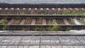 railways. Rails and sleepers on the ground near the station. Long way concept. Interlacing of tracks, railway arrows Royalty Free Stock Photo