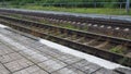 railways. Rails and sleepers on the ground near the station. Long way concept. Interlacing of tracks, railway arrows Royalty Free Stock Photo