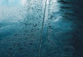 Rain, autumn day, weather concept - puddle and splashing water in rainy Royalty Free Stock Photo