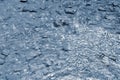 Rain. Beautiful abstract background with bad weather. Rain drops falling into the water. Royalty Free Stock Photo