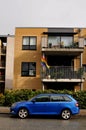 Rain bow flag flys in balcony in Kastrup Denmark