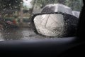 Rain on a car mirror Royalty Free Stock Photo