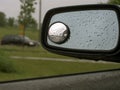 Rain on car mirror 19