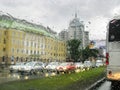 rain in city, traffic, cars, lights, drops Royalty Free Stock Photo